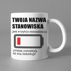 Na obrazku przedstawiony jest biały ceramiczny kubek z nadrukiem i napisem - Kubki BHP Proresult