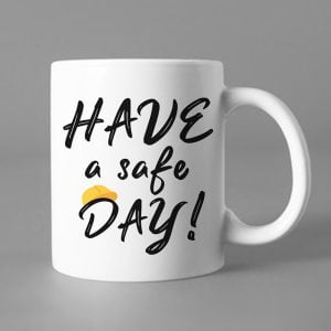 Na obrazku jest przedstawiony biały ceramiczny kubek z napisem " Have a safe day" - Dni bezpieczeństwa BHP Proresult
