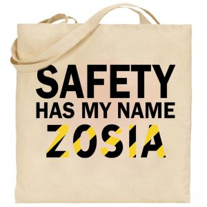 Na obrazku przedstawiona jest torba w kolorze ecru z napisem "safety it's my name" - Prezenty BHP Proresult