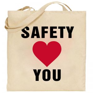 Na obrazku przedstawiona jest torba w kolorze ecru z nadrukiem serca - Safety Day BHP Proresult