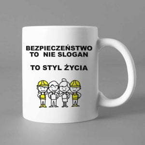 Na obrazku przedstawiono biały ceramiczny kubek z nadrukiem i napisami - Dzień bezpieczeństwa BHP PRORESULT
